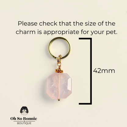 Handmade dog collar charm featuring a 17mm pink rose quartz natural gemstone faceted square crystal bead. Hung on a gold plated brass split ring with a daisy gold spacer bead that attaches onto your pet collar. Rose quartz can help pets with love, comfort and calming. Pictured showing dimensions.