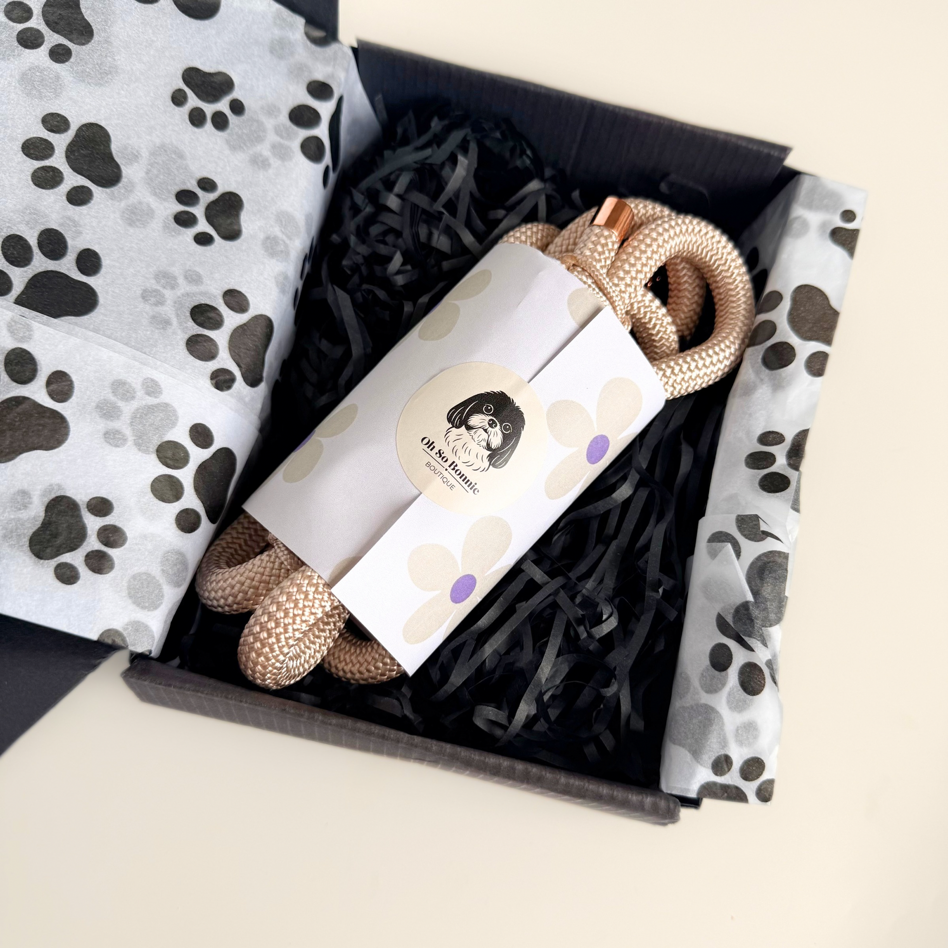 Custom made ‘pearl rose’ beige/champagne coloured nylon rope dog lead with choice of metal hardware. Four lengths available. Easy strong grip handle. Shown in the gift box.