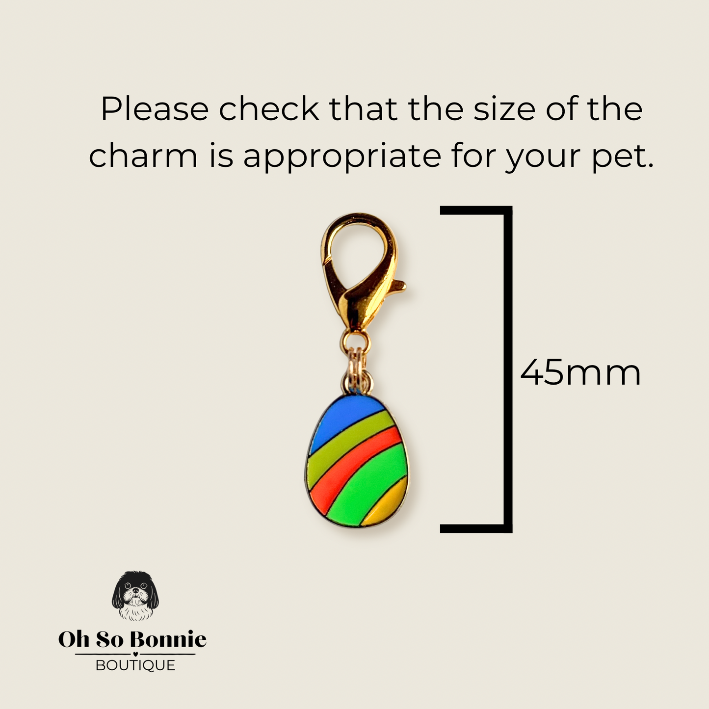 Colourful striped Easter egg enamel dog collar charm that easily attaches to collars and harnesses with a gold plated lobster clasp. Pictured showing the dimensions.￼