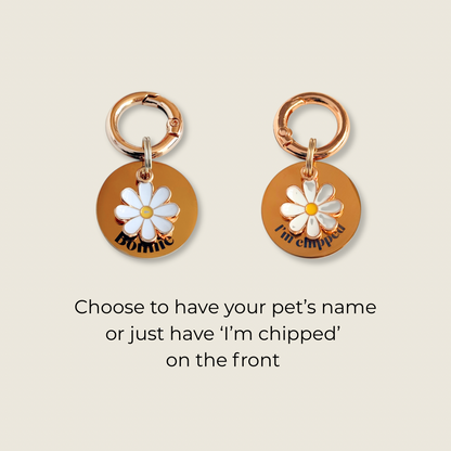 Gold white daisy flower dog collar ID tag, Enamel floral charm with dog name or ‘I’m chipped’ and address details. easily clips onto collar or harness. Picture shows choice of two options.