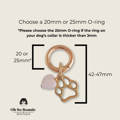 Crystal for dogs pet collar charm featuring a 10mm rose quartz heart shaped bead and a brass gold coloured paw print tag. A stone for love, calm and comfort. Pictured showing the dimensions.