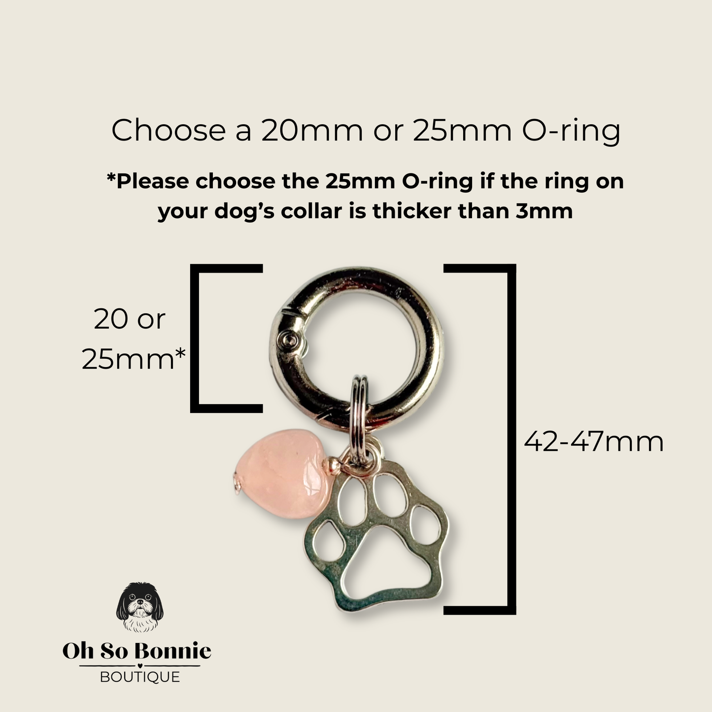 Crystal for dogs pet collar charm featuring a 10mm rose quartz heart shaped bead and a brass silver coloured paw print tag. A stone for love, calm and comfort. Pictured showing the dimensions.