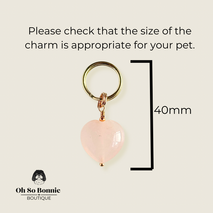 Handmade dog collar charm featuring a 15mm pink rose quartz natural gemstone crystal bead. Hung on a gold plated brass split ring that attaches onto your pet collar. Rose quartz can help pets with love, comfort and calming. Pictured showing the dimensions.