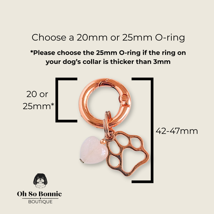 Crystal for dogs pet collar charm featuring a 10mm rose quartz heart shaped bead and a brass rose gold coloured paw print tag. A stone for love, calm and comfort. Pictured showing the dimensions.