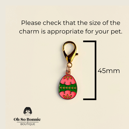 Colourful pink and green patterned Easter egg enamel dog collar charm that easily attaches to collars and harnesses with a gold plated lobster clasp. Pictured showing the dimensions.￼